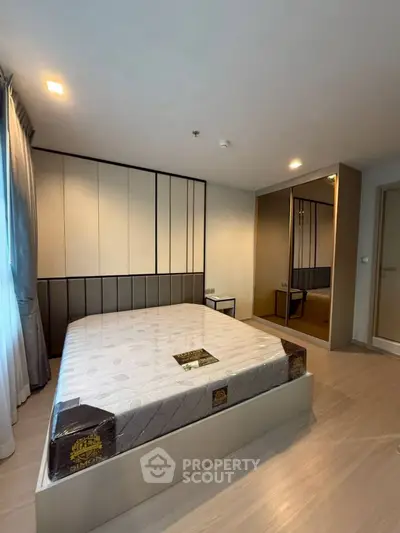 Modern bedroom with stylish design and ample natural light