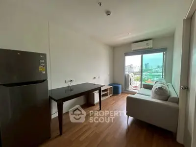 Modern living room with city view and sleek furniture