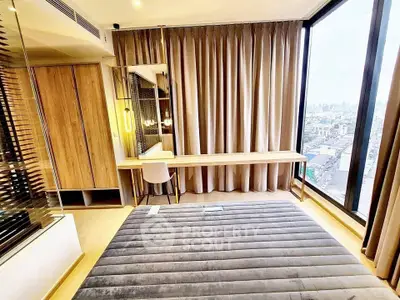 Luxurious bedroom with panoramic city view and elegant decor