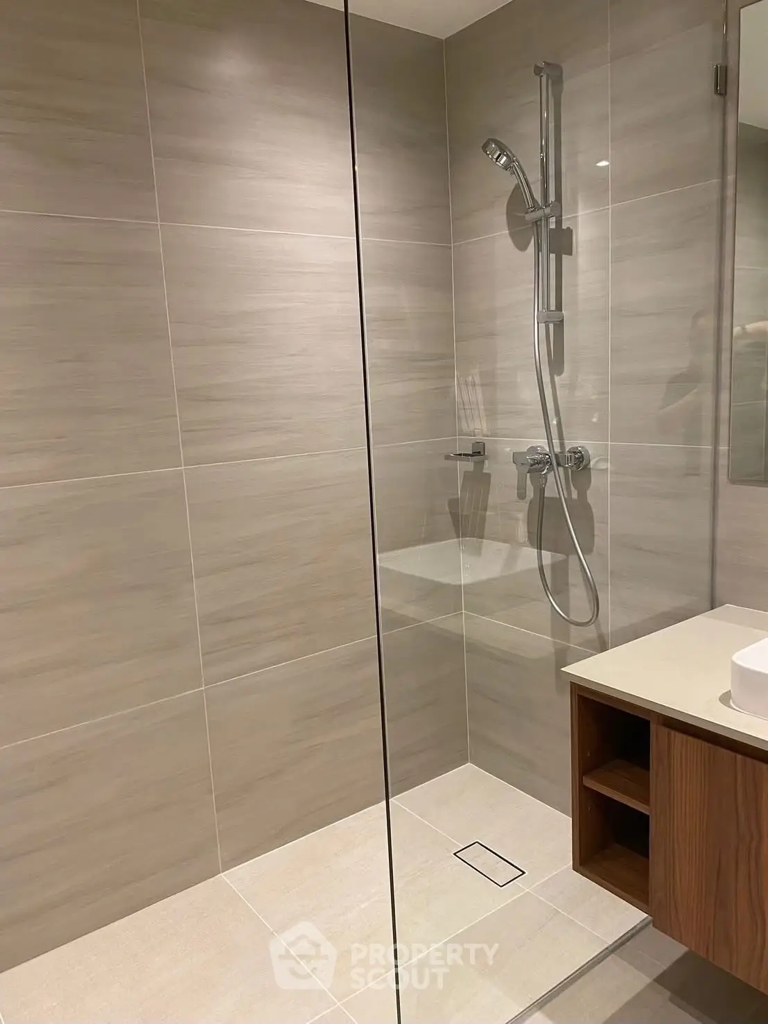 Modern bathroom with sleek shower and elegant fixtures