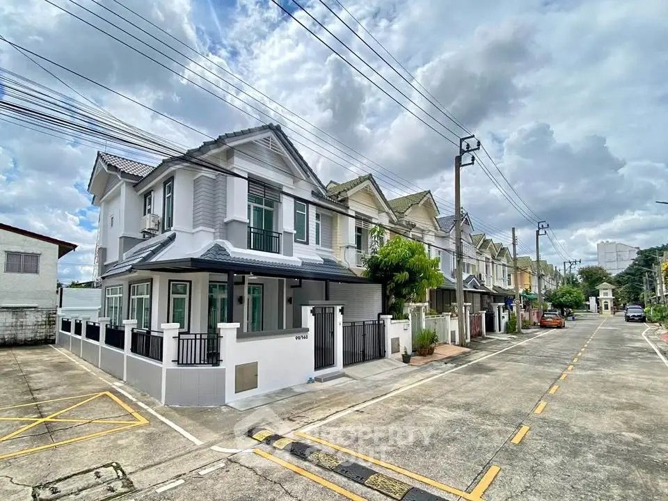 Charming suburban house with modern design and spacious driveway in a peaceful neighborhood.