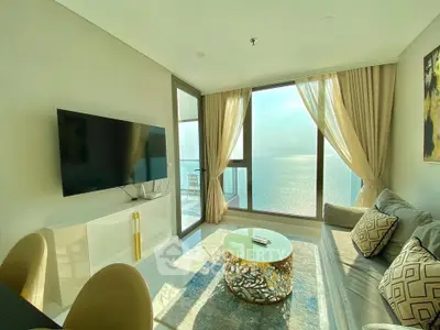 Luxurious living room with stunning sea view and elegant decor