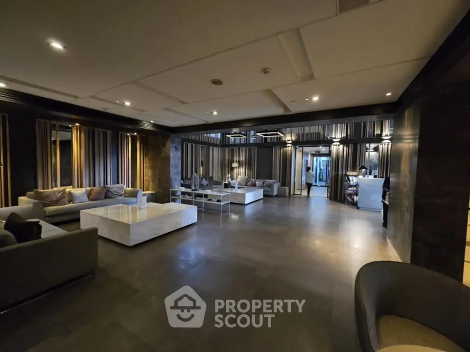 Luxurious modern living room with elegant seating and ambient lighting