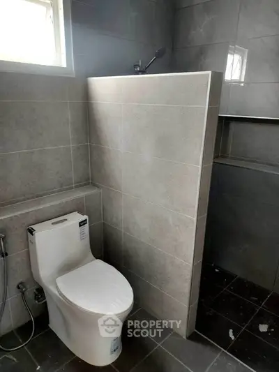 Modern bathroom with sleek tile design and contemporary fixtures
