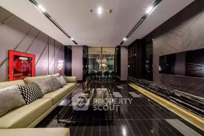 Luxurious modern living room with sleek black flooring and elegant decor