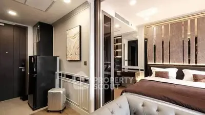 Luxurious modern bedroom with elegant decor and stylish furnishings in a high-end apartment.