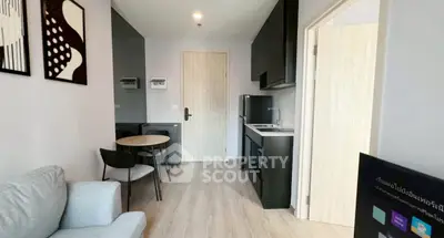 Modern apartment interior with cozy living area and sleek kitchen design