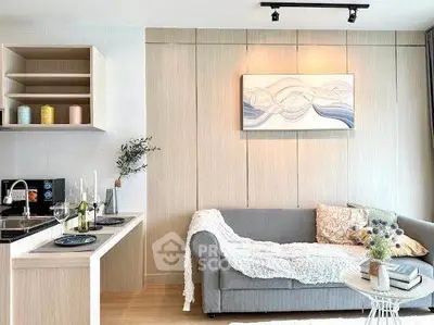 Modern living room with stylish decor and cozy sofa in a bright apartment.