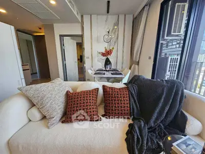 Modern living room with cozy sofa and stylish decor in high-rise apartment