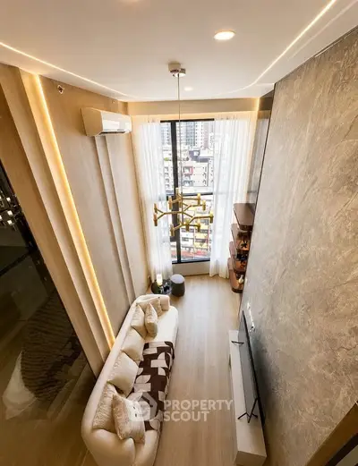 Luxurious high-ceiling living room with modern decor and city view