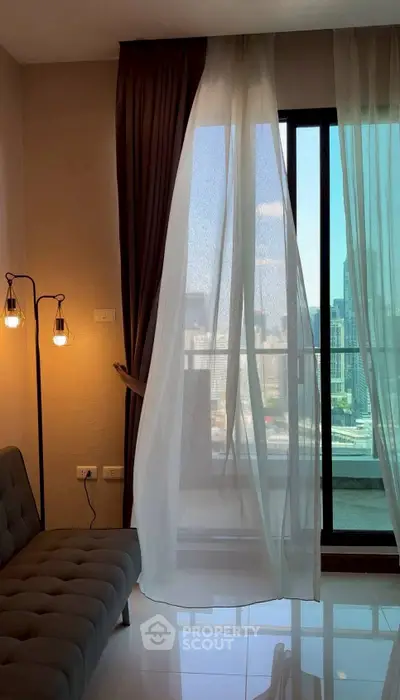 Modern living room with city view and elegant curtains