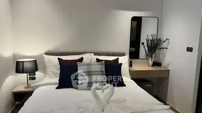 Cozy bedroom with elegant decor and stylish lighting