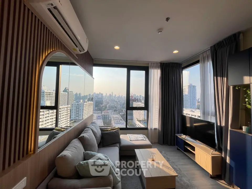 Modern living room with panoramic city view and stylish decor