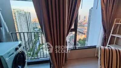 Stunning city view from modern apartment with balcony and washing machine.
