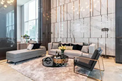 Luxurious modern living room with elegant decor and large windows