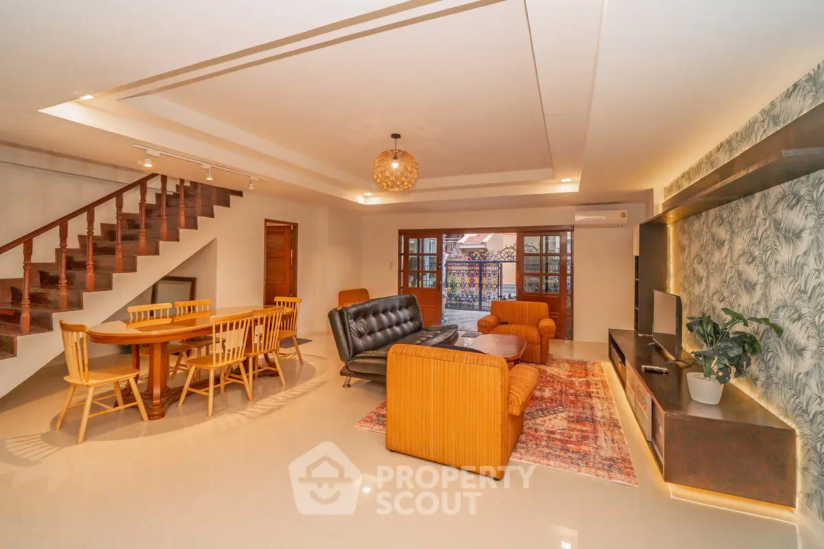 Spacious living room with modern furniture and elegant decor