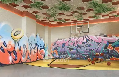 Vibrant indoor basketball court with graffiti art and modern design