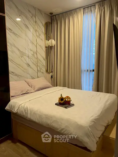 Luxurious bedroom with elegant marble wall and cozy lighting