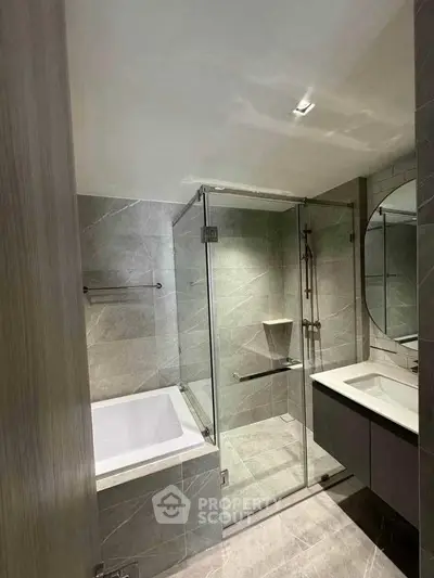 Modern bathroom with glass shower and sleek design
