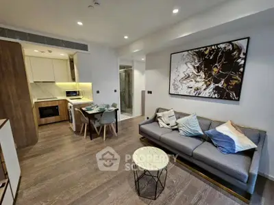 Modern living room with open kitchen and stylish decor