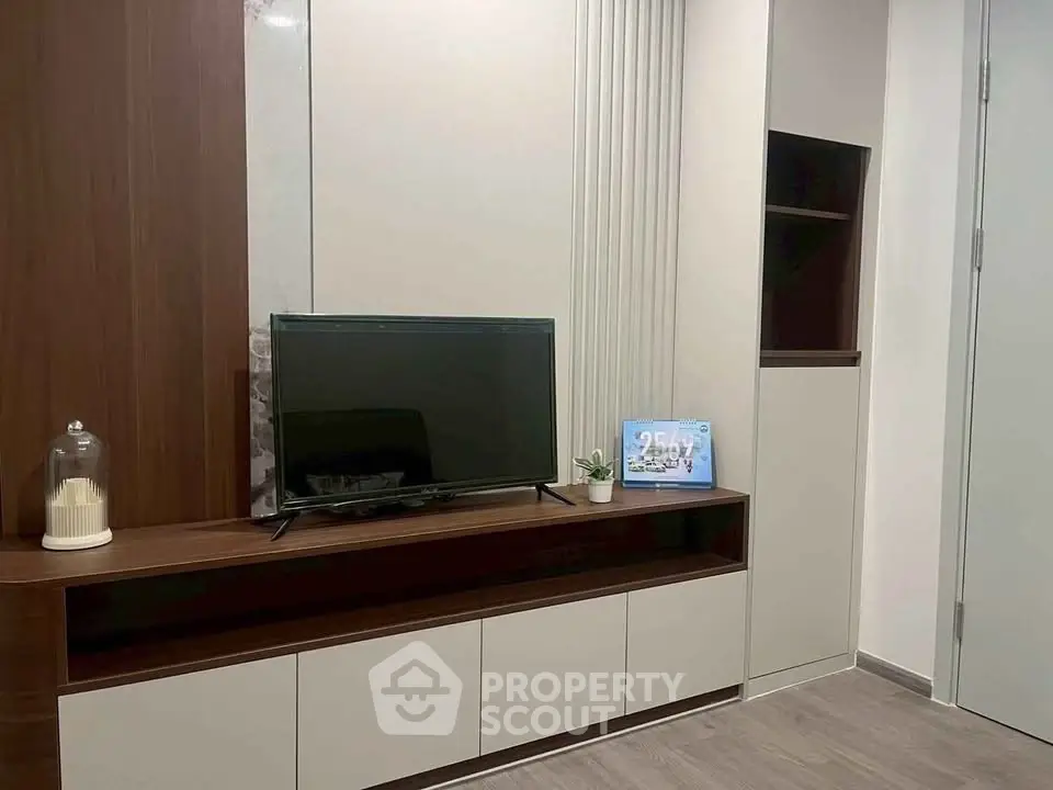 Modern living room with sleek TV unit and stylish decor