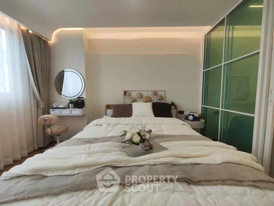 Luxurious bedroom with elegant decor and natural lighting