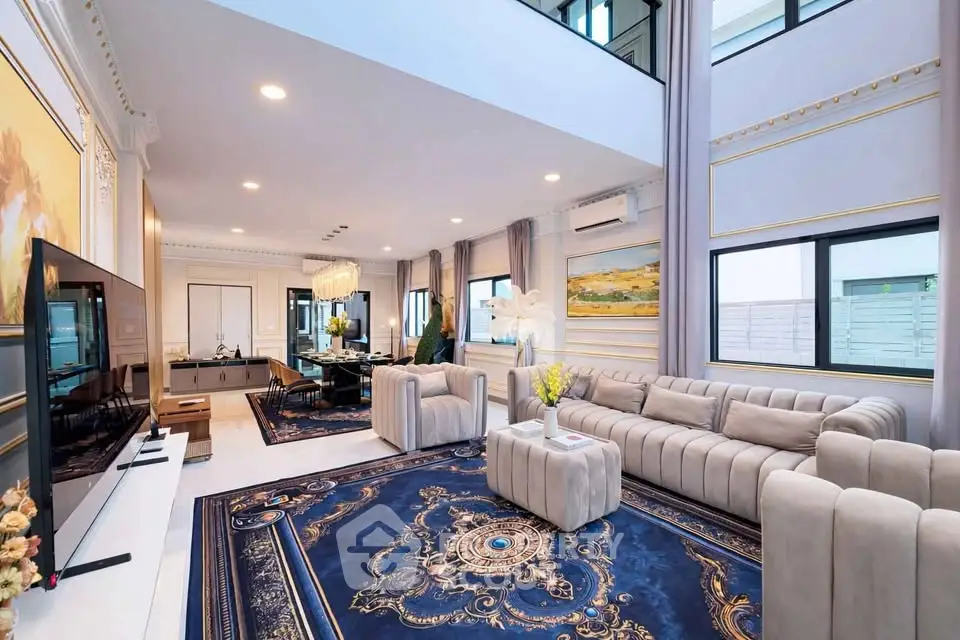 Luxurious living room with elegant decor and spacious seating area