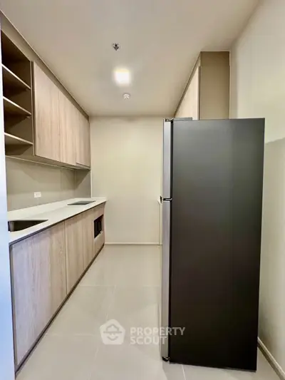 Modern kitchen with sleek cabinetry and stainless steel appliances