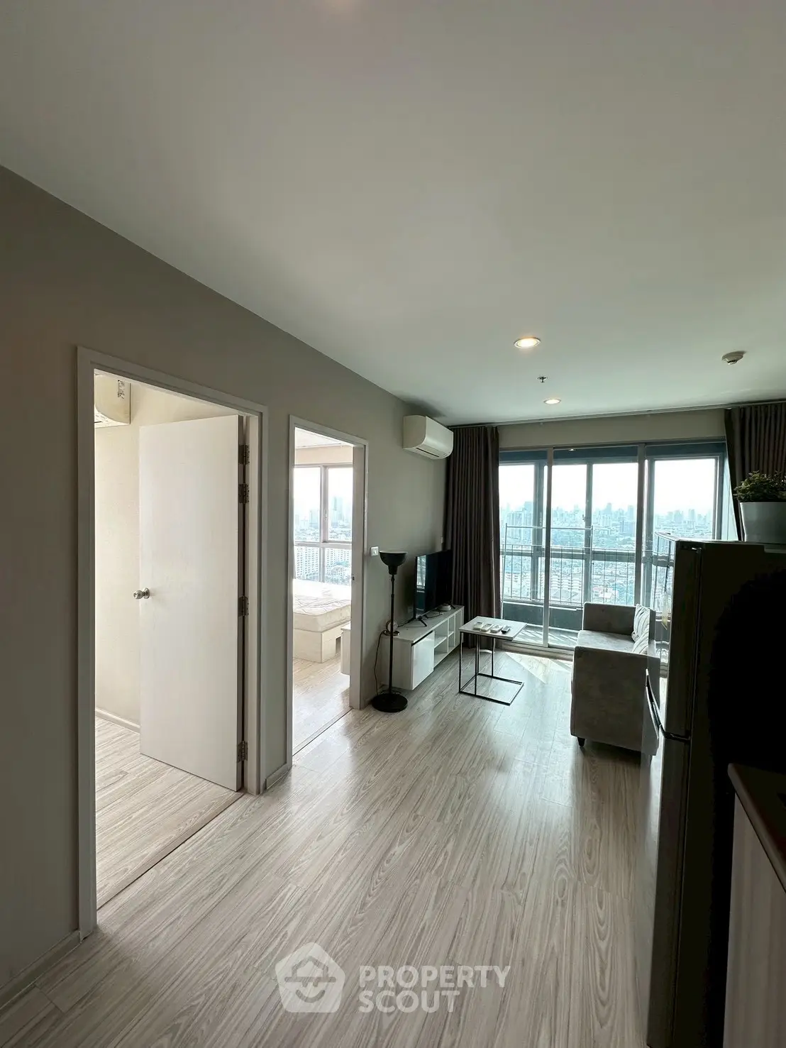 Modern living room with city view and sleek interior design