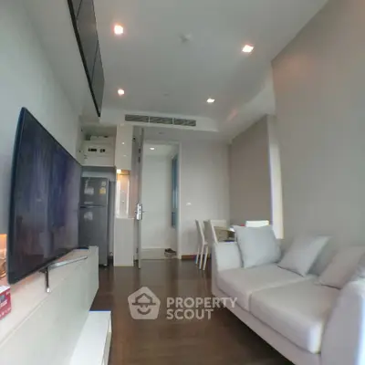 Modern living room with sleek design and cozy ambiance