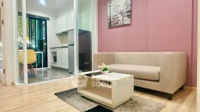 Modern living room with cozy sofa and stylish kitchen view