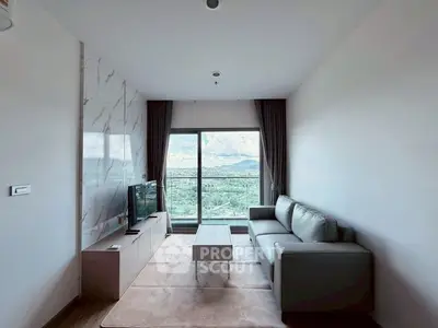 Modern living room with stunning mountain view and sleek furniture