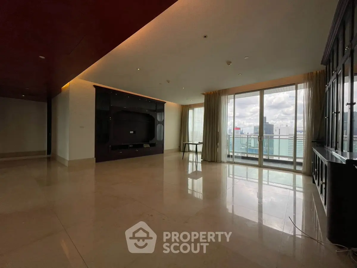 Spacious modern living room with city view and large windows