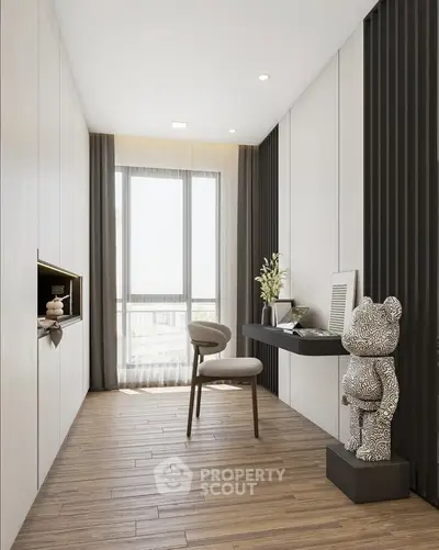 Modern study room with elegant decor and large window for natural light.