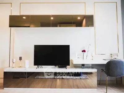 Modern living room with sleek TV unit and elegant decor