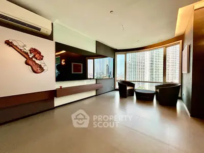 Spacious modern living room with large windows and city view