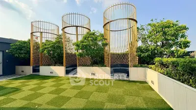 Luxurious rooftop garden with modern design and lush greenery