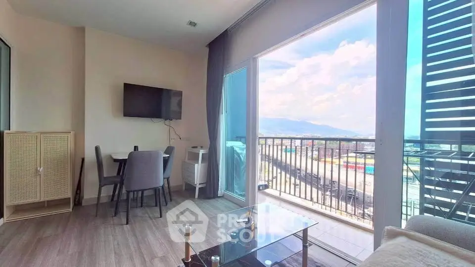 Modern living room with balcony and stunning mountain view