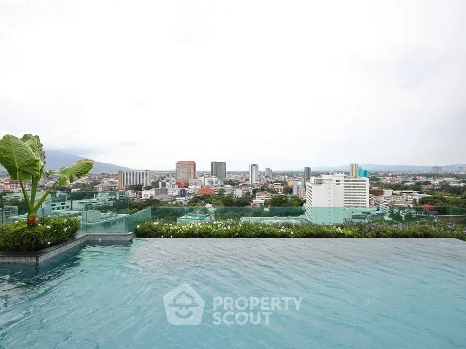 Stunning rooftop pool with panoramic city view, perfect for luxury living.