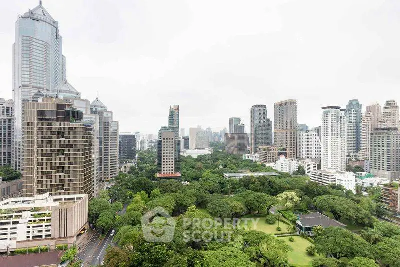 Stunning cityscape view with lush greenery and modern skyscrapers, perfect for urban living enthusiasts.