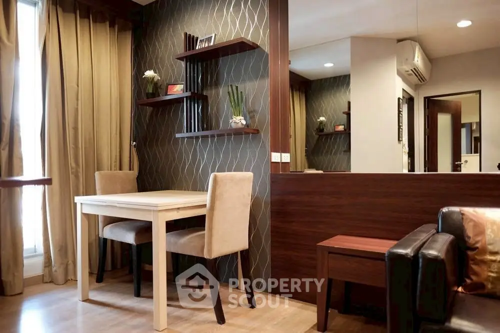 Modern living room with elegant decor and dining area in cozy apartment