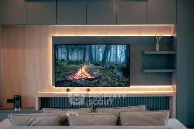 Modern living room with stylish TV setup and ambient lighting