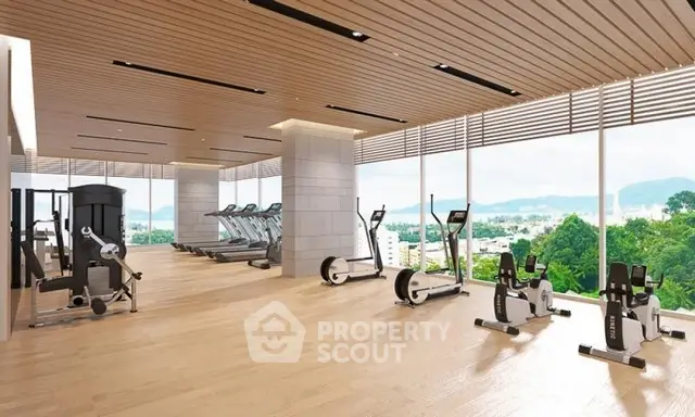 Spacious modern gym with panoramic city views and state-of-the-art equipment.