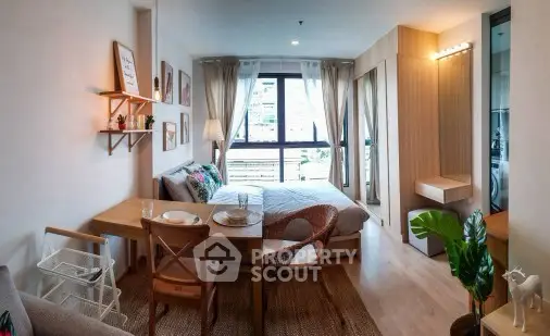 Cozy studio apartment with modern decor and natural light