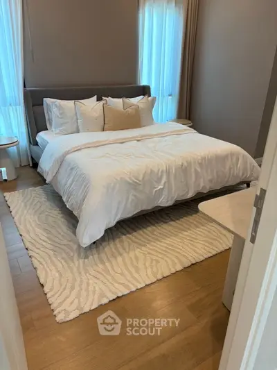 Elegant bedroom with cozy bed and stylish decor