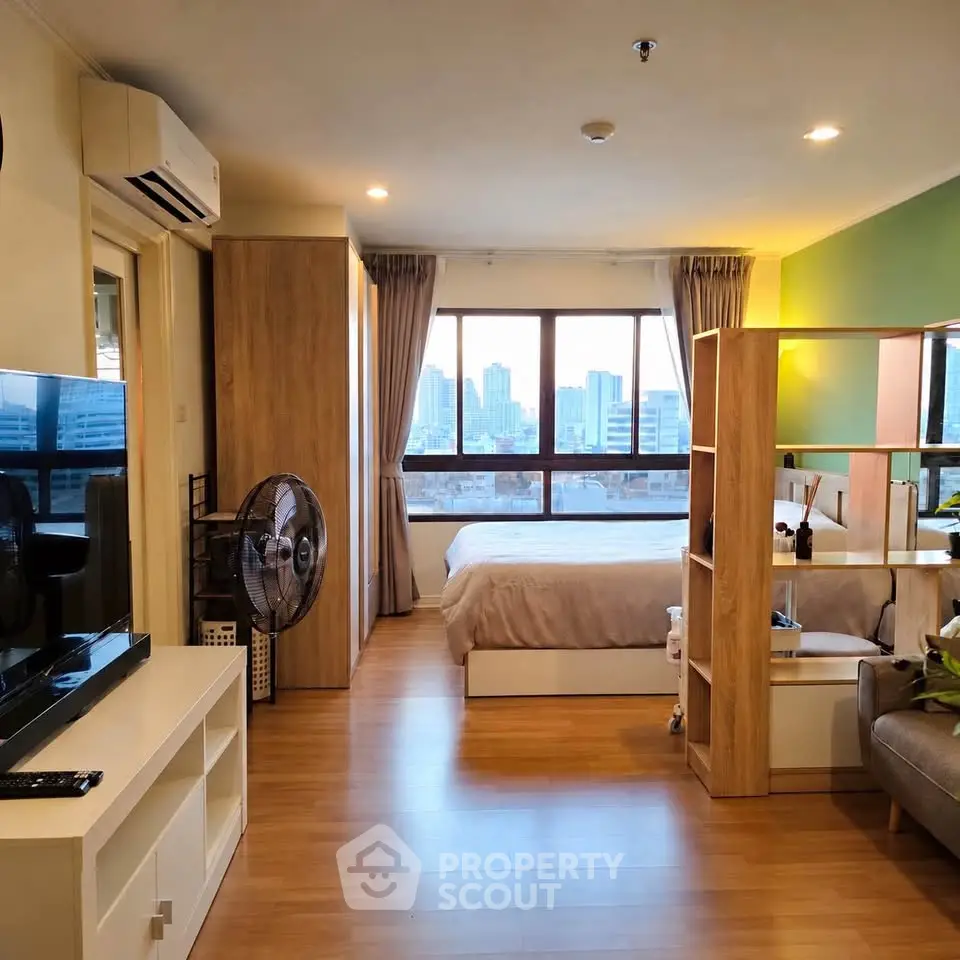 Spacious studio apartment with city view and modern furnishings