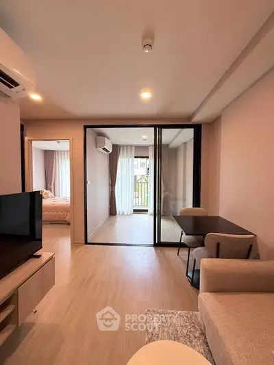 Modern apartment interior with open living room and balcony view