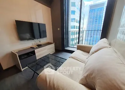 Modern living room with city view and sleek furniture