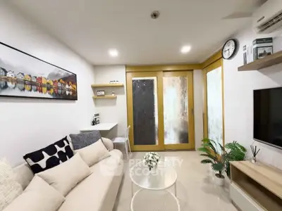 Modern living room with cozy sofa and stylish decor