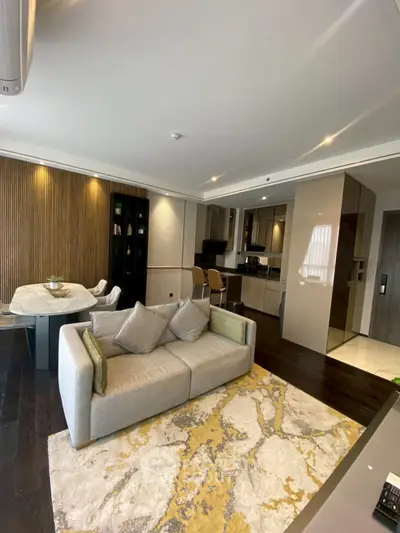 Luxurious open-plan living room with modern kitchen and elegant decor